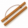 18-inch teak magnetic hanging frame featuring natural wood bars, hidden magnets, and a leather hanging cord. Designed for an easy, modern way to display posters, prints, and scratch-off travel artwork.